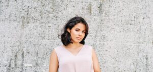 a woman feeling stressed during pregnancy during the holidays