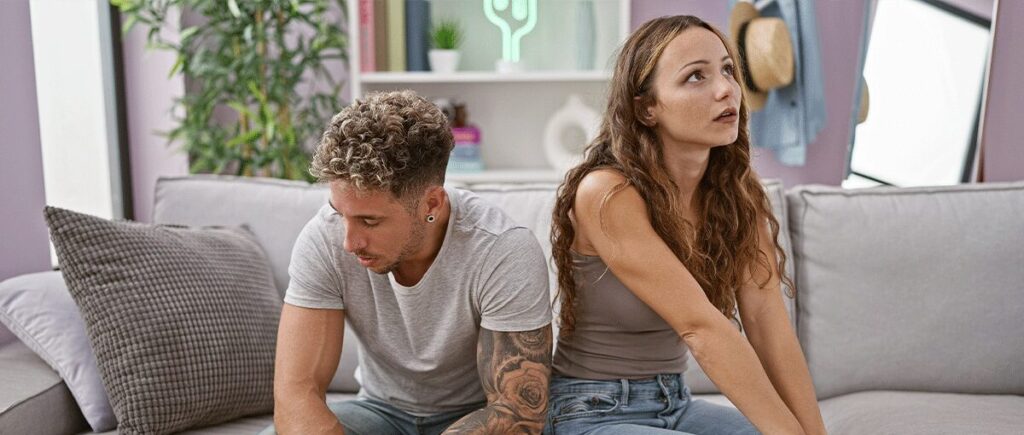 Couple experiencing tension as one partner feels pressured to have an abortion.